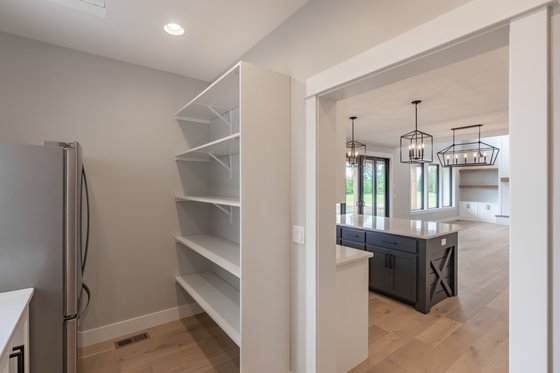 Interior - Laundry for Farmhouse House Plan #1070-39 - 3 bed, 3.5 bath