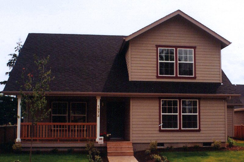 Dream House Plan - Farmhouse Exterior - Front Elevation Plan #124-308