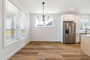 Farmhouse Style House Plan - 3 Beds 2 Baths 1500 Sq/Ft Plan #1070-250 