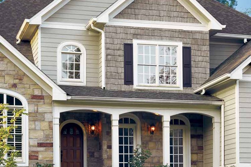House Plan Design - Exterior - Front Elevation 4 for Traditional House Plan #927-573 - 4 bed, 3.5 bath