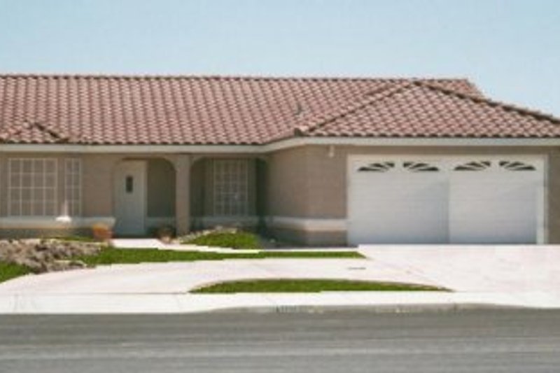 House Plan Design - Mediterranean Exterior - Front Elevation Plan #1-273
