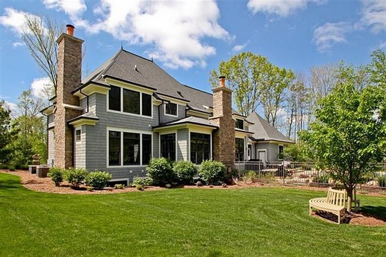 European style home, rear elevation photo