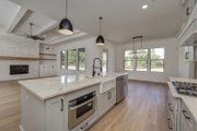 Farmhouse Style House Plan - 4 Beds 3.5 Baths 2906 Sq/Ft Plan #927-1028 