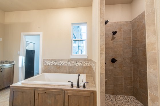 Photo 4 for Country House Plan #932-65 - 3 bed, 3 bath