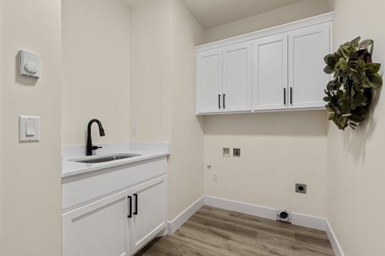 Interior - Laundry for Farmhouse House Plan #1070-205 - 3 bed, 2 bath