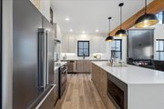 Farmhouse Style House Plan - 3 Beds 2.5 Baths 1951 Sq/Ft Plan #1070-238 
