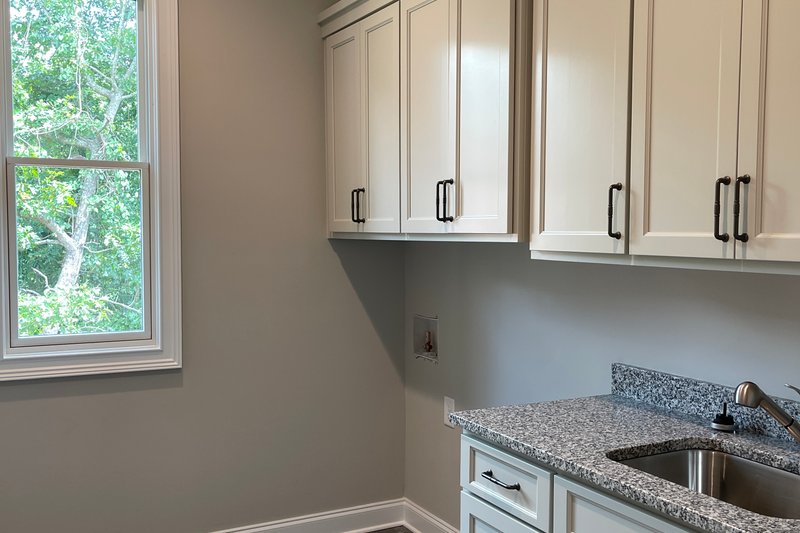 Architectural House Design - Interior - Laundry for Modern House Plan #437-130 - 4 bed, 4 bath