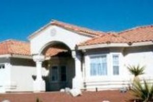 Adobe / Southwestern Exterior - Front Elevation Plan #1-734