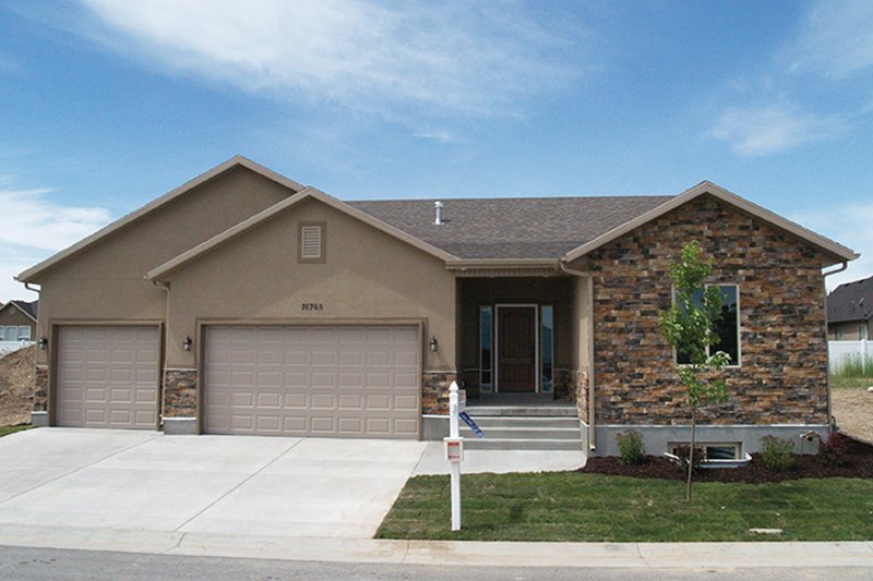 Architectural House Design - Exterior - Front Elevation 4 for Ranch House Plan #1060-12 - 5 bed, 3.5 bath