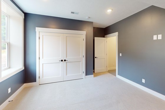 Interior - Bedroom 2 for Farmhouse House Plan #1089-46 - 3 bed, 2.5 bath