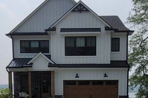 Dream House Plan - Farmhouse Exterior - Front Elevation Plan #1057-32