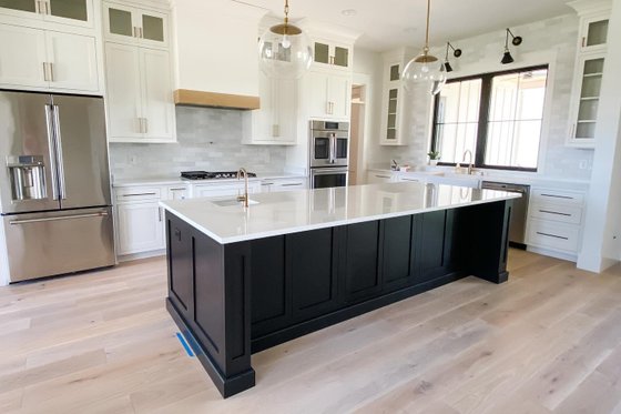 Photo 8 for Farmhouse House Plan #1074-24 - 4 bed, 3.5 bath