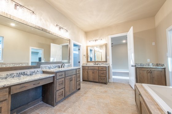 Photo 3 for Country House Plan #932-65 - 3 bed, 3 bath