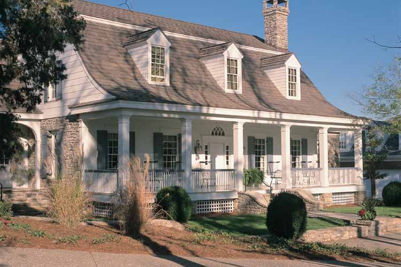 dutch colonial house with porch