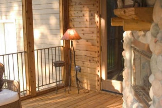 Screened porch photo of Craftsman style home