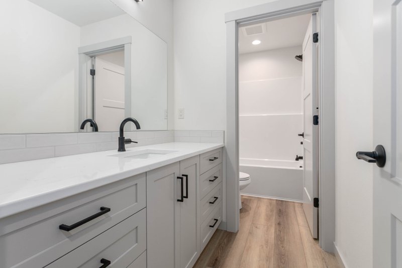 House Blueprint - Interior - Master Bathroom 1 for Contemporary House Plan #1070-273 - 4 bed, 2.5 bath