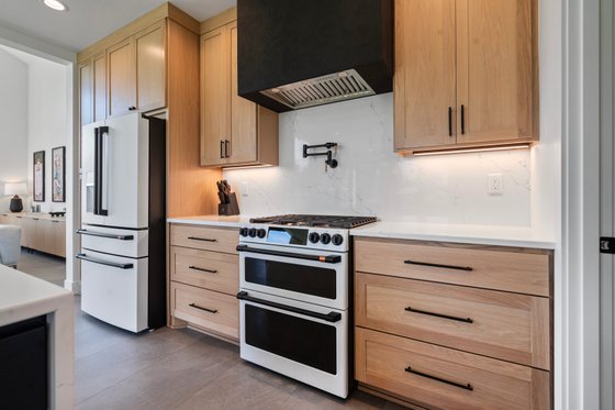 Interior - Kitchen for Contemporary House Plan #1070-214 - 4 bed, 3.5 bath