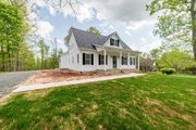 Farmhouse Style House Plan - 3 Beds 2.5 Baths 1703 Sq/Ft Plan #1116-21 Exterior 