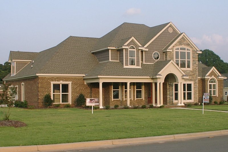 Architectural House Design - Traditional Exterior - Front Elevation Plan #63-285