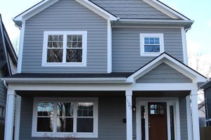 Architectural House Design - Traditional Exterior - Front Elevation Plan #1057-13