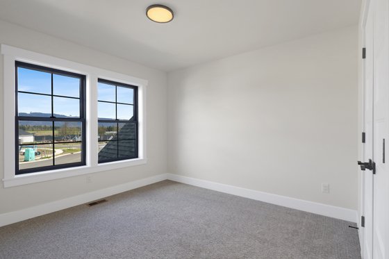 Interior - Bedroom 5 for Farmhouse House Plan #1070-223 - 4 bed, 2.5 bath