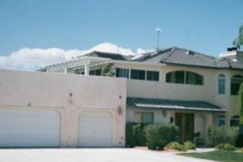 Dream House Plan - Mediterranean Exterior - Front Elevation Plan #1-798