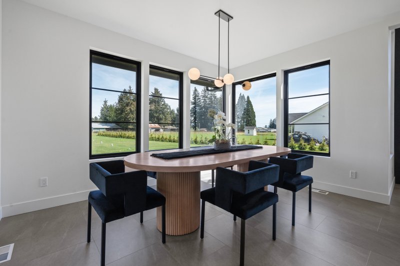 House Design - Interior - Dining Room for Contemporary House Plan #1070-214 - 4 bed, 3.5 bath
