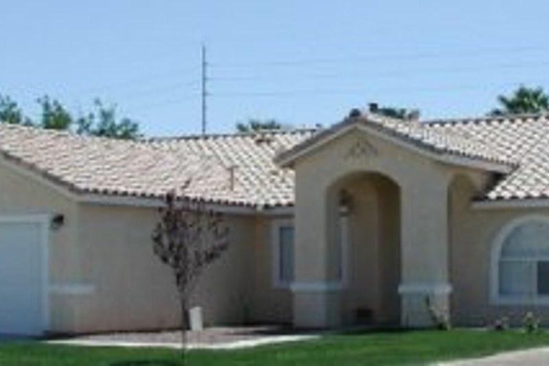 House Plan Design - Mediterranean Exterior - Front Elevation Plan #1-281