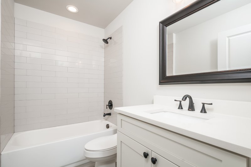 Dream House Plan - Interior - Bathroom 1 for Farmhouse House Plan #20-2539 - 3 bed, 2.5 bath
