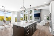 Contemporary Style House Plan - 3 Beds 3 Baths 2589 Sq/Ft Plan #1070-145 Photo 