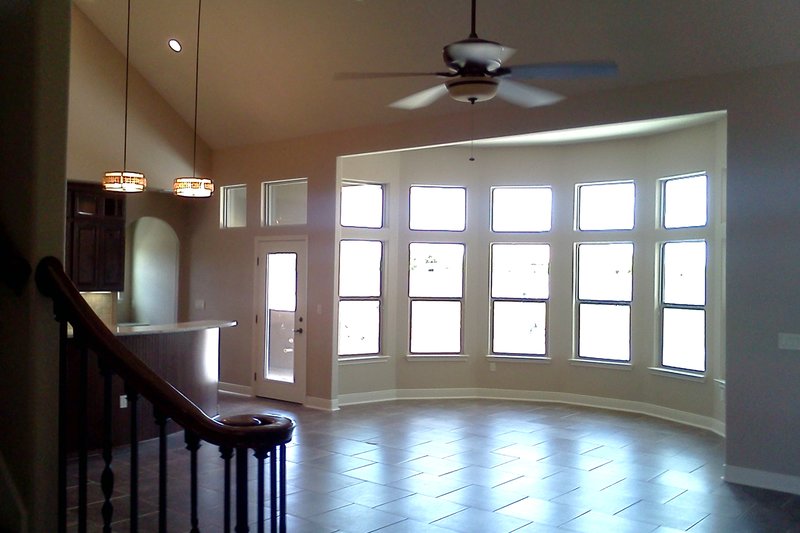 Architectural House Design - Interior - Family Room for European House Plan #20-2437 - 3 bed, 3 bath