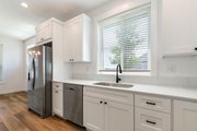 Farmhouse Style House Plan - 3 Beds 2 Baths 1500 Sq/Ft Plan #1070-250 