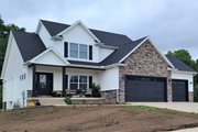 Traditional Style House Plan - 4 Beds 3 Baths 2154 Sq/Ft Plan #20-2394 