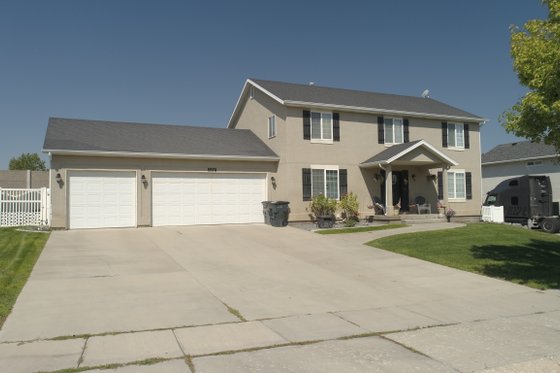 Exterior - Front Elevation 6 for Traditional House Plan #1060-206 - 4 bed, 2.5 bath