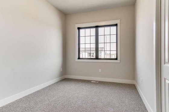 Interior - Bedroom 2 for Farmhouse House Plan #20-2462 - 3 bed, 2.5 bath