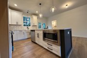 Farmhouse Style House Plan - 3 Beds 2 Baths 1334 Sq/Ft Plan #44-292 