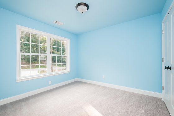 Interior - Bedroom 2 for Farmhouse House Plan #20-2539 - 3 bed, 2.5 bath