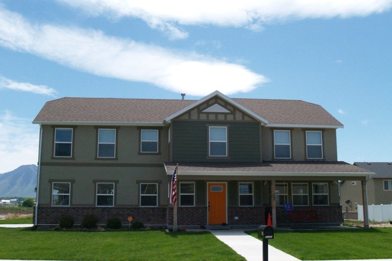 Architectural House Design - Exterior - Front Elevation 5 for Traditional House Plan #1060-138 - 4 bed, 2.5 bath