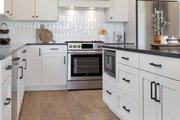 Farmhouse Style House Plan - 3 Beds 2.5 Baths 2134 Sq/Ft Plan #1070-171 