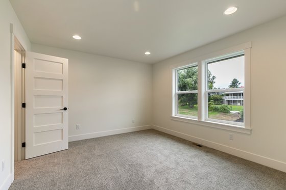 Interior - Bedroom 1 for Craftsman House Plan #1070-43 - 4 bed, 2.5 bath