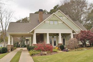1600 square foot craftsman home with large front porch and outdoor living and entertaining spaces.