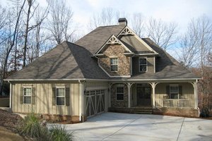 Craftsman style home in the woods photo elevation