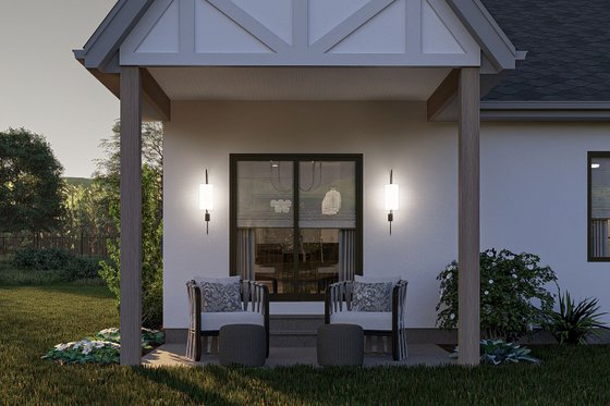 Exterior - Rear Elevation for Tudor House Plan #455-373 - 2 bed, 2 bath