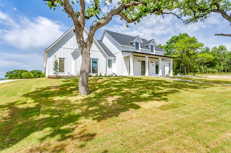 Architectural House Design - Exterior - Front Elevation for Farmhouse House Plan #1074-97 - 4 bed, 2.5 bath