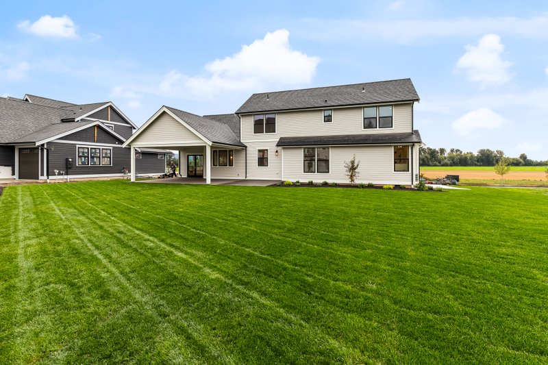 Dream House Plan - Exterior - Rear Elevation 1 for Craftsman House Plan #1070-43 - 4 bed, 2.5 bath