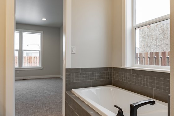 Interior - Master Bathroom 1 for Farmhouse House Plan #1070-53 - 3 bed, 2.5 bath