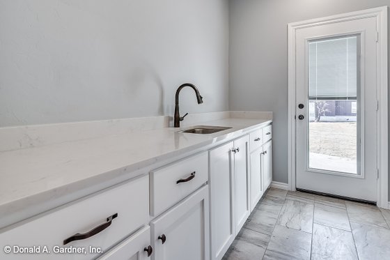 Interior - Laundry for Farmhouse House Plan #929-1070 - 4 bed, 3 bath