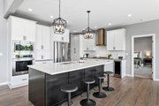 Contemporary Style House Plan - 3 Beds 3 Baths 2589 Sq/Ft Plan #1070-145 Photo 