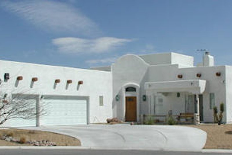 House Design - Adobe / Southwestern Exterior - Front Elevation Plan #1-558