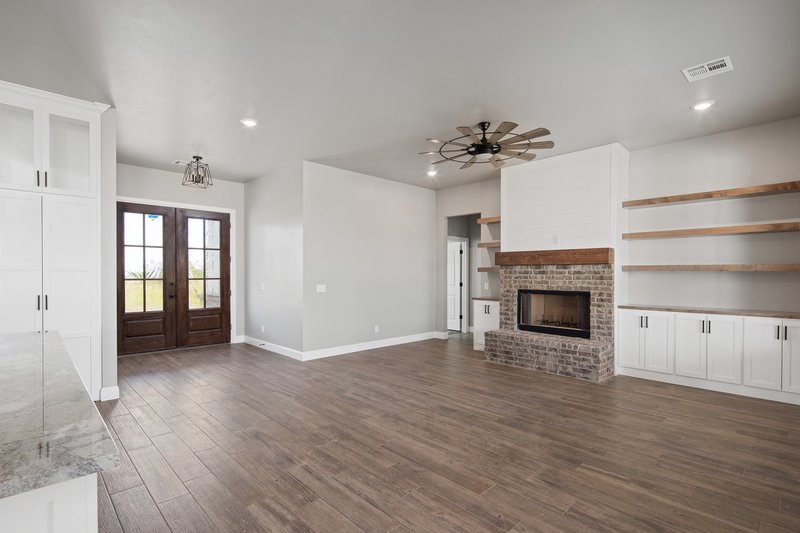 Home Plan - Interior - Family Room 4 for Farmhouse House Plan #430-184 - 4 bed, 2.5 bath